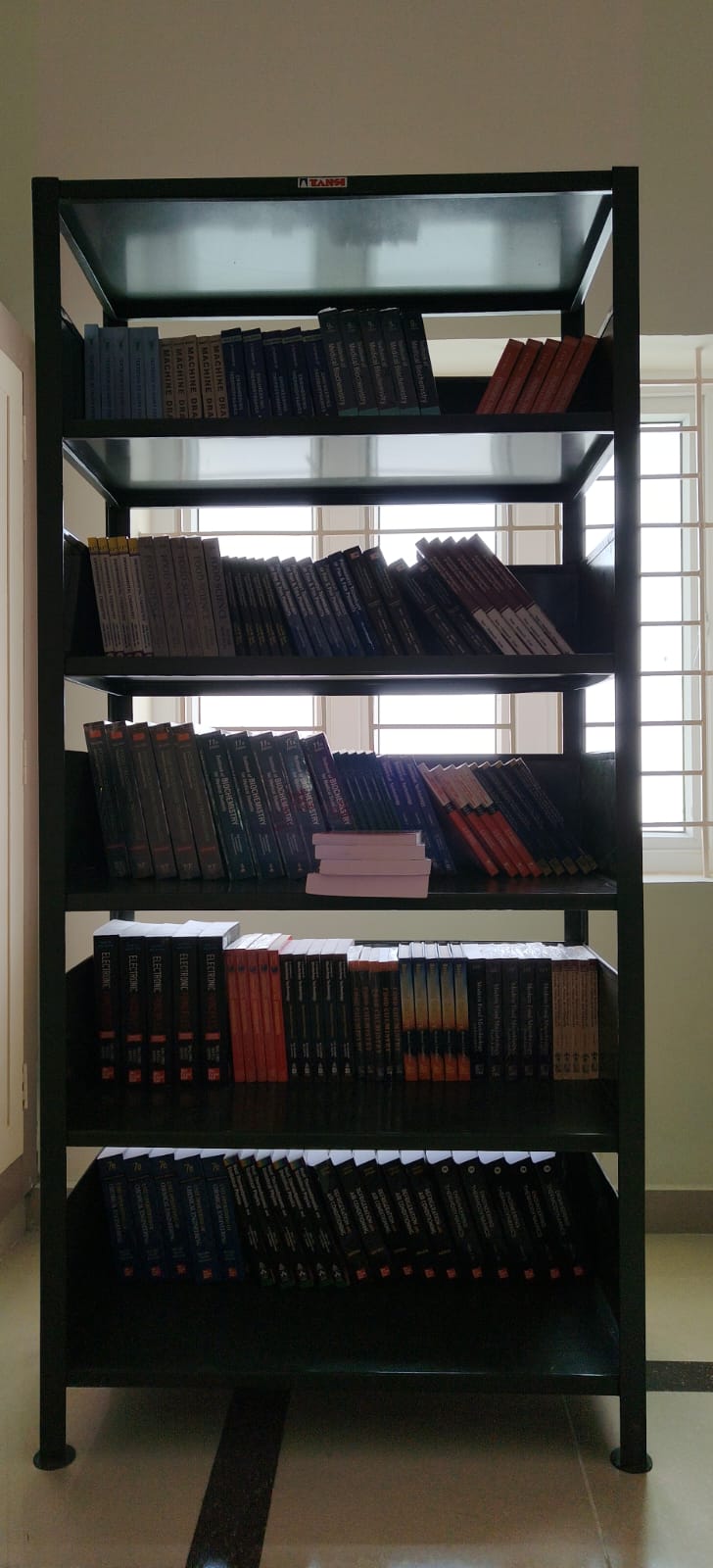 Students studying in quiet library area