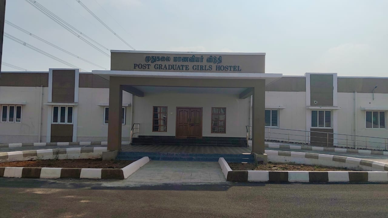 Neat and organized student dormitory bedroom